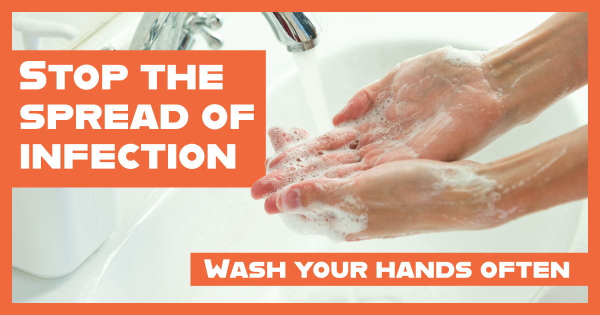 A person washing their hands with a message that says: Stop the spread of infection. Wash your hands.